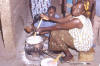 Cooking pot: photo of a woman stirring food
