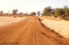 Weg: foto van de met gravel verharde weg Sadore - Niamey.