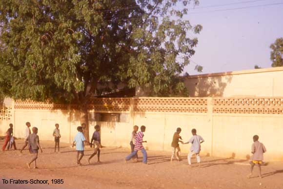 Children playing outside in a street in Zinder, Niger